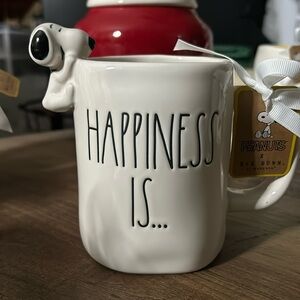 Rae Dunn Peanuts SNOOPY HAPPINESS IS…Mug. Snoopy hanging on side of mug